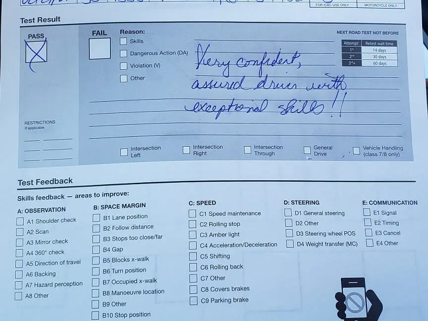 A real ICBC road test result sheet marked Pass, with the examiner's handwritten comment